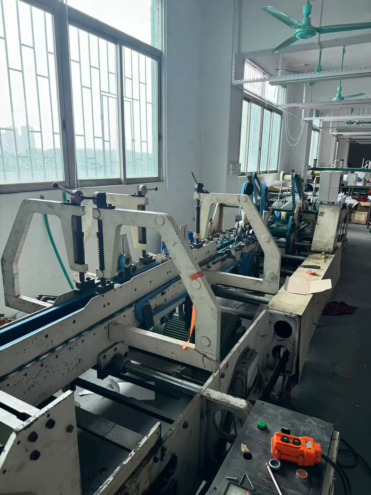 Packaging gluing and forming line