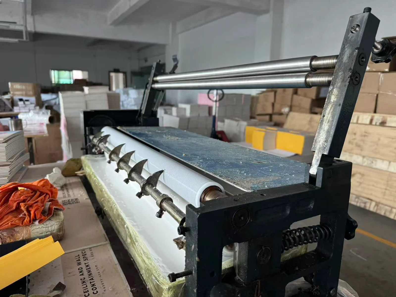 Paper-product gluing equipment